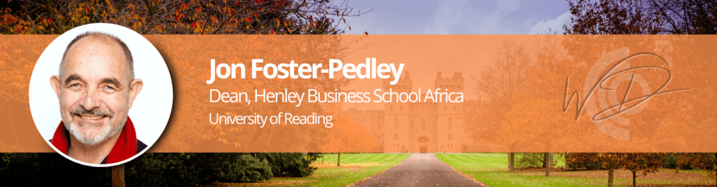 Banner with Jon Foster-Pedley portrait on the left and orange overlay text: 'Jon Foster-Pedley, Dean, Henley Business School Africa, University of Reading' across the center, plus a WD logo on the right over a campus with autumn trees and a path in the background.