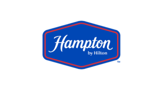 Hampton by Hilton logo on a blue hex badge with white script.