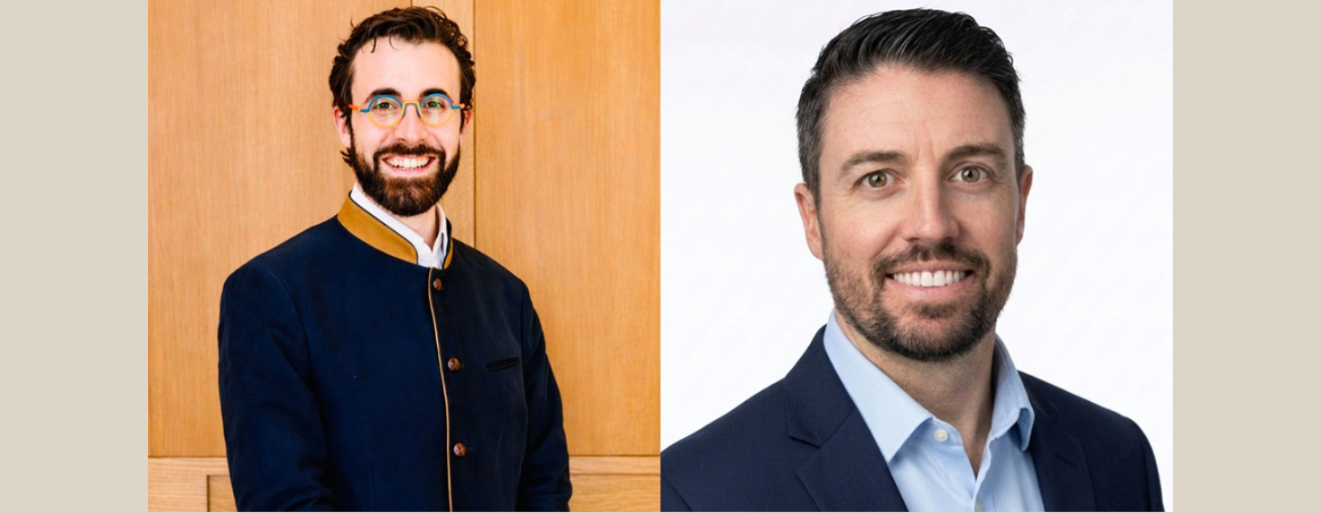 Two men shown side by side in headshots; left man with colorful glasses and a beard wearing a dark blue jacket, right man in a navy suit and light blue shirt, both smiling