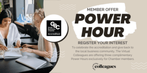 Banner advertising a Member Offer 'Power Hour'; two women study documents at a table as a circular accreditation badge appears on the left.