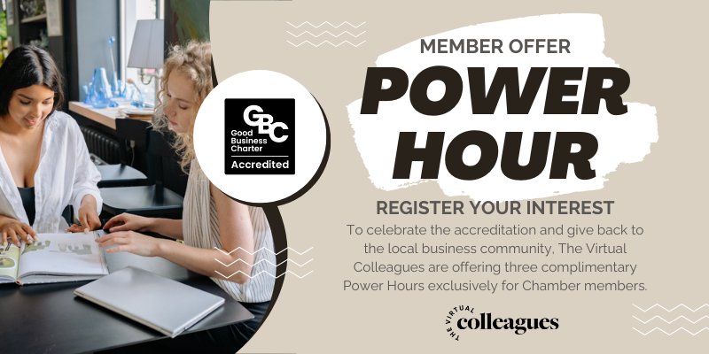 Banner advertising a Member Offer 'Power Hour'; two women study documents at a table as a circular accreditation badge appears on the left.