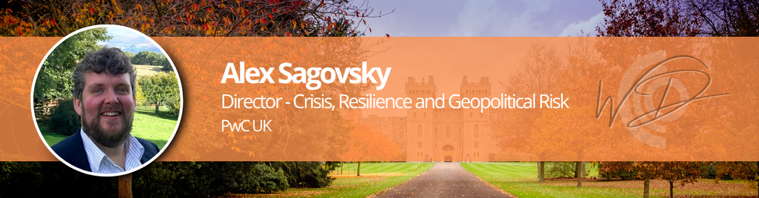 Alex Sagovsky Speaker Bannner 26 1 | Thames Valley Chamber of Commerce Professional banner with Alex Sagovsky's round headshot on the left and an orange gradient strip showing his name and title (Director, Crisis, Resilience and Geopolitical Risk, PwC UK) over a campus path with autumn trees in the background.