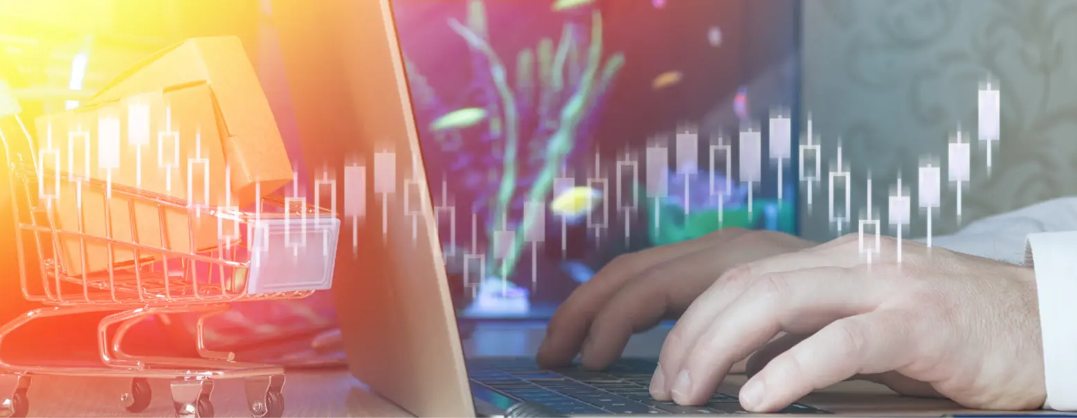 NEW - News item size 95 | Thames Valley Chamber of Commerce Hands typing on a laptop with a small shopping cart beside, overlaid by translucent stock charts in warm colors.